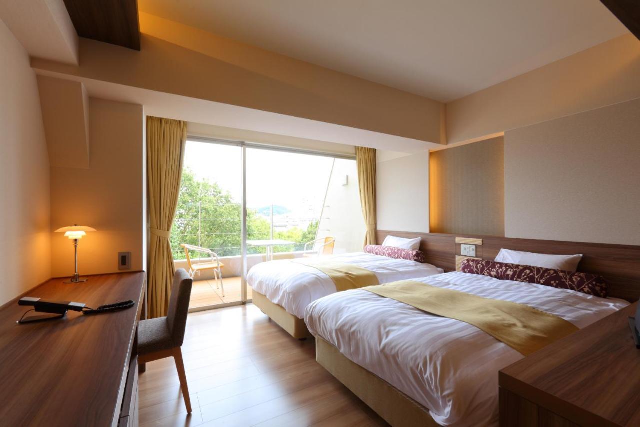 บันสยุคาคุ ชิกิชิมะ Hotel อุเรชิโนะ ภายนอก รูปภาพ
